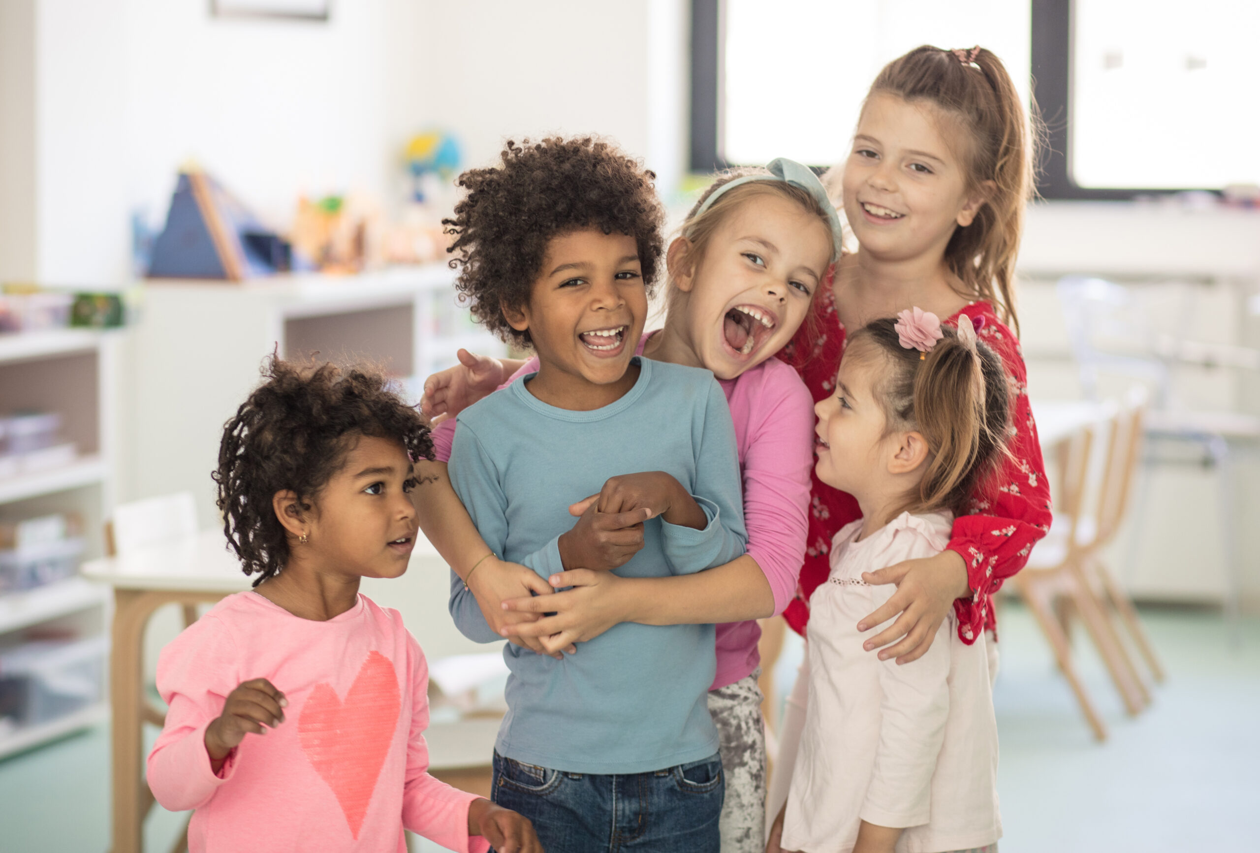 The most beautiful is the embrace of a friend. The most beautiful is the embrace of a friend. Children in preschool.